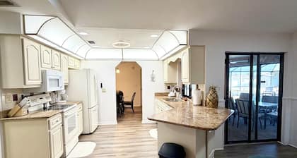 3-bedroom house in marvelous Port Charlotte with AC comfort and heated pool.