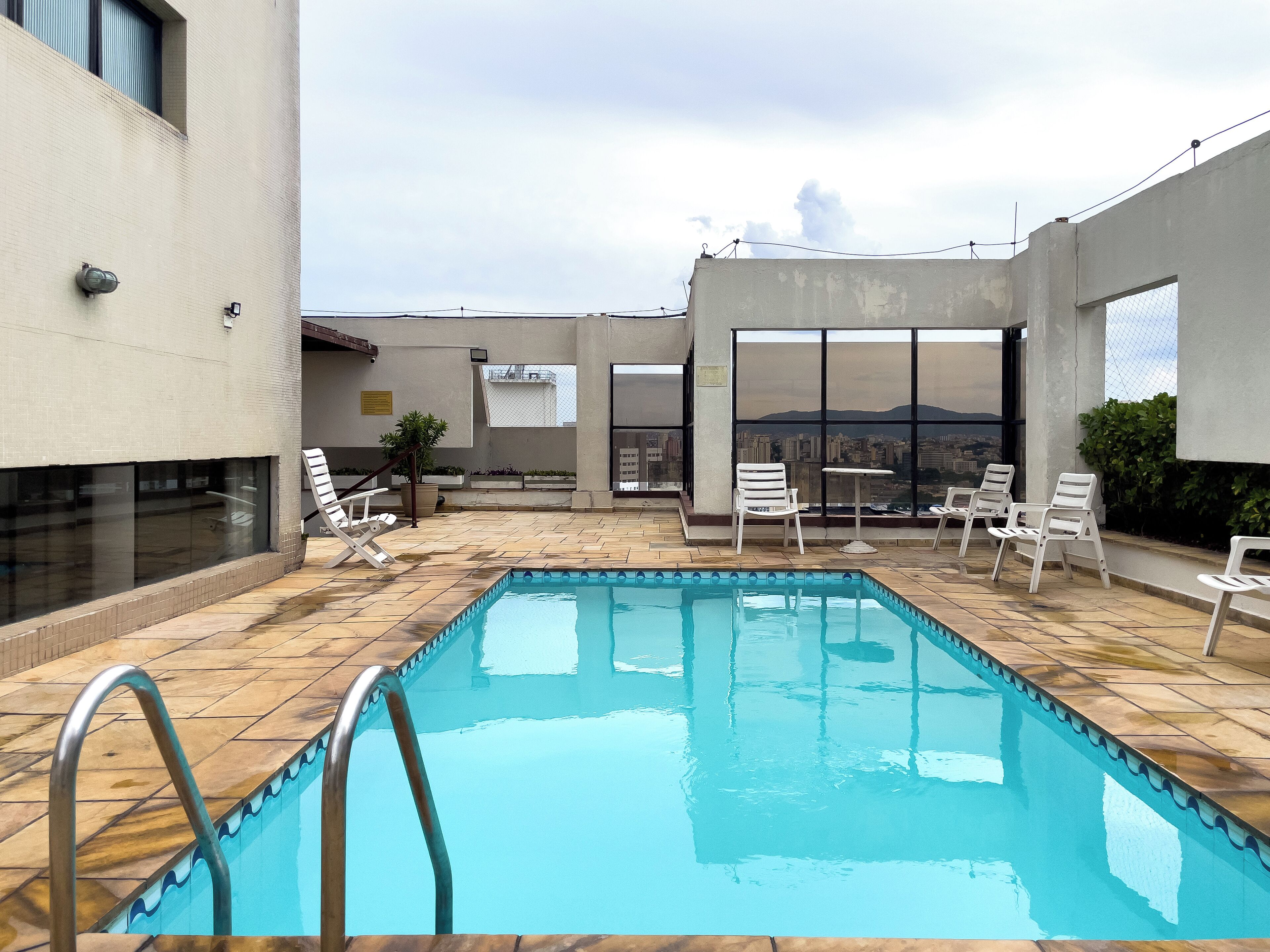 Outdoor pool, pool umbrellas, sun loungers