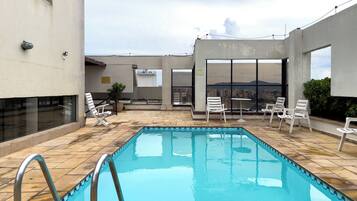 Outdoor pool, pool umbrellas, pool loungers