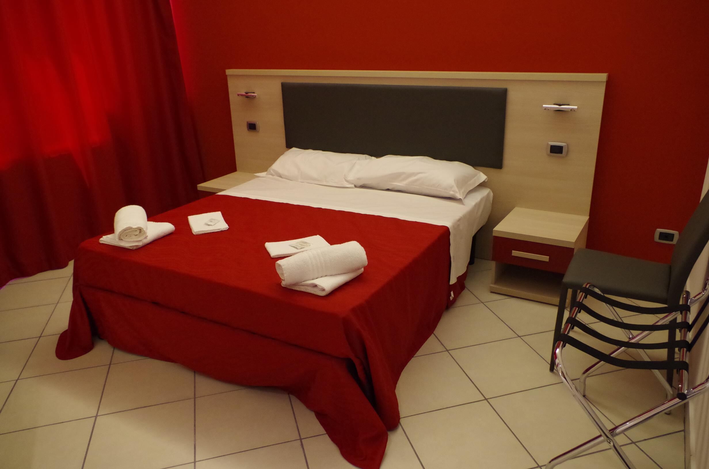 Double or Twin Room | Minibar, in-room safe, desk, blackout drapes