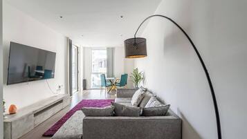 Apartment, 1 Bedroom, Accessible, Balcony | Living area | Books