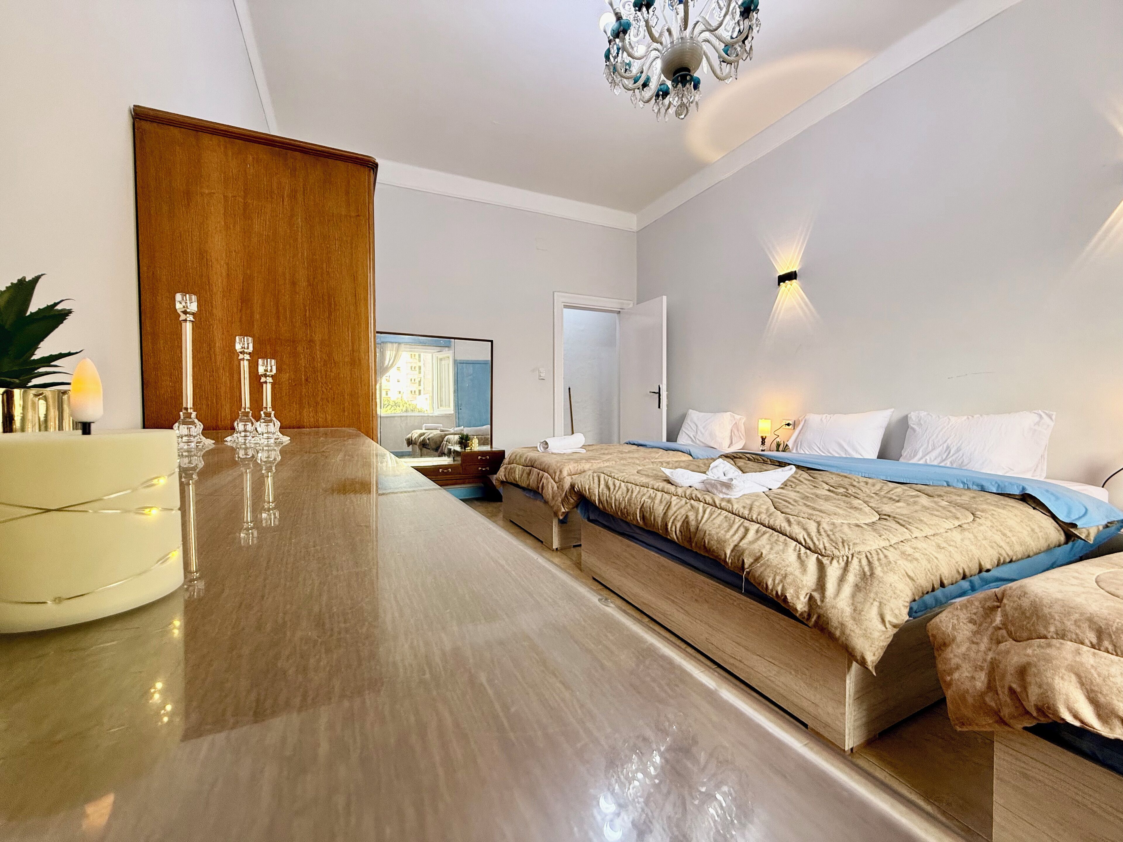 Deluxe-Apartment, 3 Schlafzimmer, Balkon, Stadtblick | Bettwäsche aus ägyptischer Baumwolle, hochwertige Bettwaren