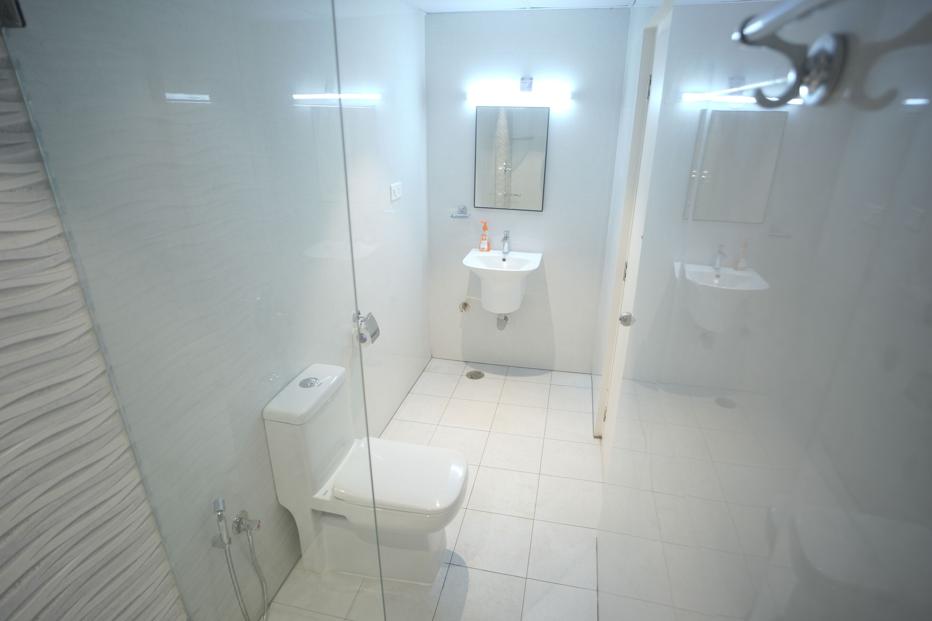 Shower, towels, soap, shampoo