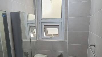 Hair dryer, towels, soap, toilet paper