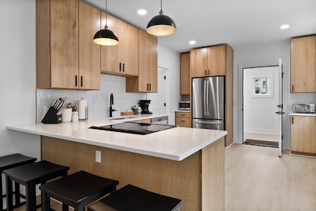 Fridge, microwave, oven, stovetop. The Gingerbread Flat in downtown Michigan City