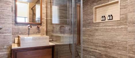 Shower, hair dryer, towels, soap