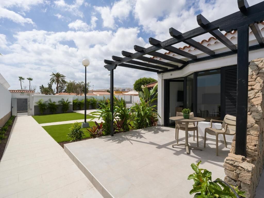 Bungalow, uitzicht op tuin | Buiten dineren