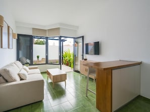 Bungalow, Garden View | Living area | TV - PASO CHICO GRAN CANARIA (San Bartolomé de Tirajana)