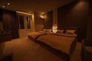 Deluxe Quadruple Room, City View | Desk, laptop workspace, blackout drapes, soundproofing - Sydney Hotel (Cairo)