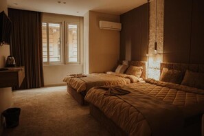 Deluxe Quadruple Room, City View | Desk, laptop workspace, blackout drapes, soundproofing - Sydney Hotel (Cairo)