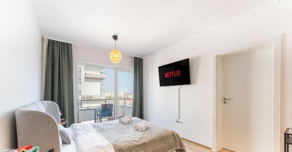 Appartamento, balcone, vista città | Una scrivania, ferro/asse da stiro, Wi-Fi gratuito