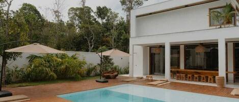 Outdoor pool, pool umbrellas, pool loungers