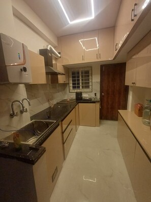 Private kitchen - Modern & Cozy 2BHK, 2ACs, Fully Furnished, Near IT-Hub (Hyderabad)