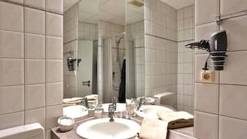 Shower, towels, soap, toilet paper