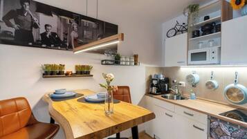 Fridge, microwave, stovetop, coffee/tea maker