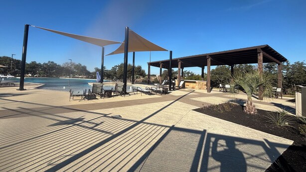 A poolside area with sunshades, lounge chairs, and a covered seating area. - Large 5-Bedroom Georgetown Getaway/Minutes to Blue Hole Park + Historic Square (Georgetown)