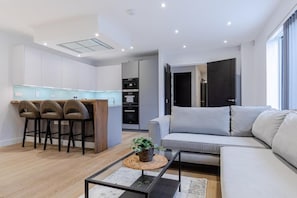 Appartement Penthouse, 3 chambres | Aire de séjour