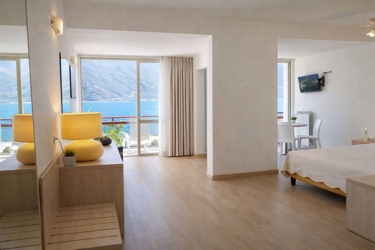 Superior Room, Balcony, Lake View | In-room safe, desk, free WiFi