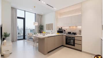 Luxury Apartment, Balcony, City View | Private kitchen | Full-sized fridge, microwave, oven, stovetop