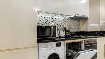 Deluxe-huoneisto, kaupunkinäköala | Yksityinen keittiö