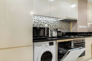 Deluxe-huoneisto, kaupunkinäköala | Yksityinen keittiö