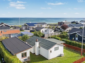A coastal residential area with houses, some with solar panels, and a view of the sea. - "Ginger" - 50m from the sea by Interhome (Otterup)