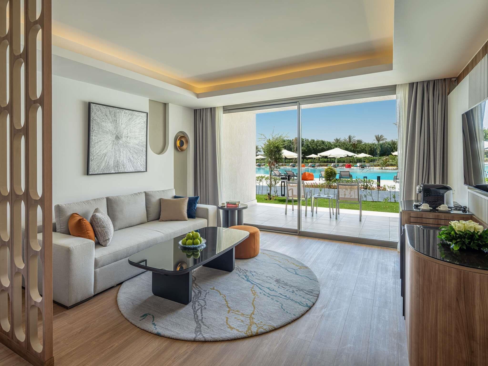 Egyptian cotton sheets, premium bedding, free minibar, in-room safe