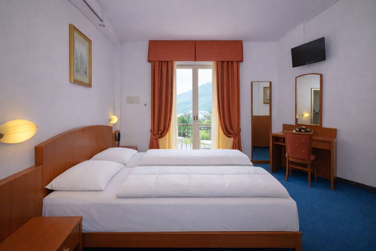 Standard Double or Twin Room, Balcony, Courtyard View | In-room safe, desk, blackout curtains, free WiFi