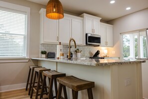 Fridge, microwave, oven, stovetop - Magnolia By The Bay – A charming 3-bedroom, 2-bath cottage in Perdido Beach, AL (Elberta)