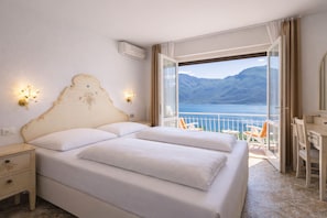 Habitación estándar con 1 cama doble o 2 individuales, balcón, vistas al lago | Caja fuerte y wifi gratis