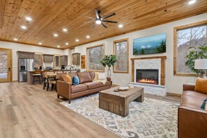 TV, fireplace - New! 6BR Luxe Pool Cabin*Hot Tub*Games*Fireplace (Sevierville)