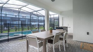 Outdoor dining - 6BR Family Pool Home at Windsor Cay (Clermont)