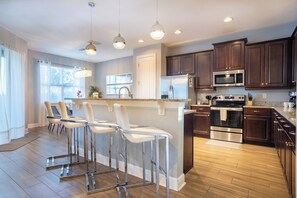 Fridge, microwave, oven, stovetop - 6BR Home w/ Theater & Pool Near Disney (Kissimmee)