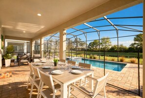 Outdoor dining - Luxury 9BR Villa w Pool Theater & Game Room (Kissimmee)