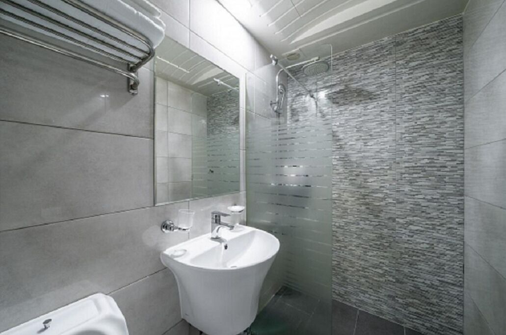 Standard Double Room | Bathroom | Hair dryer, slippers, towels, soap