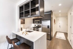 Fridge, microwave, oven, stovetop - Modern Luxury Apt in Hudson Yards (New York, NY)