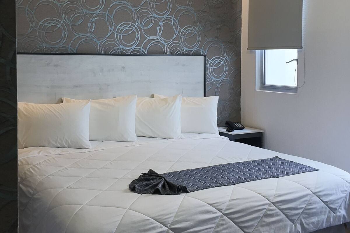 Junior Suite | In-room safe, desk, laptop workspace, iron/ironing board