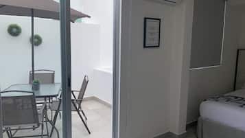 Standard Suite | In-room safe, desk, laptop workspace, iron/ironing board