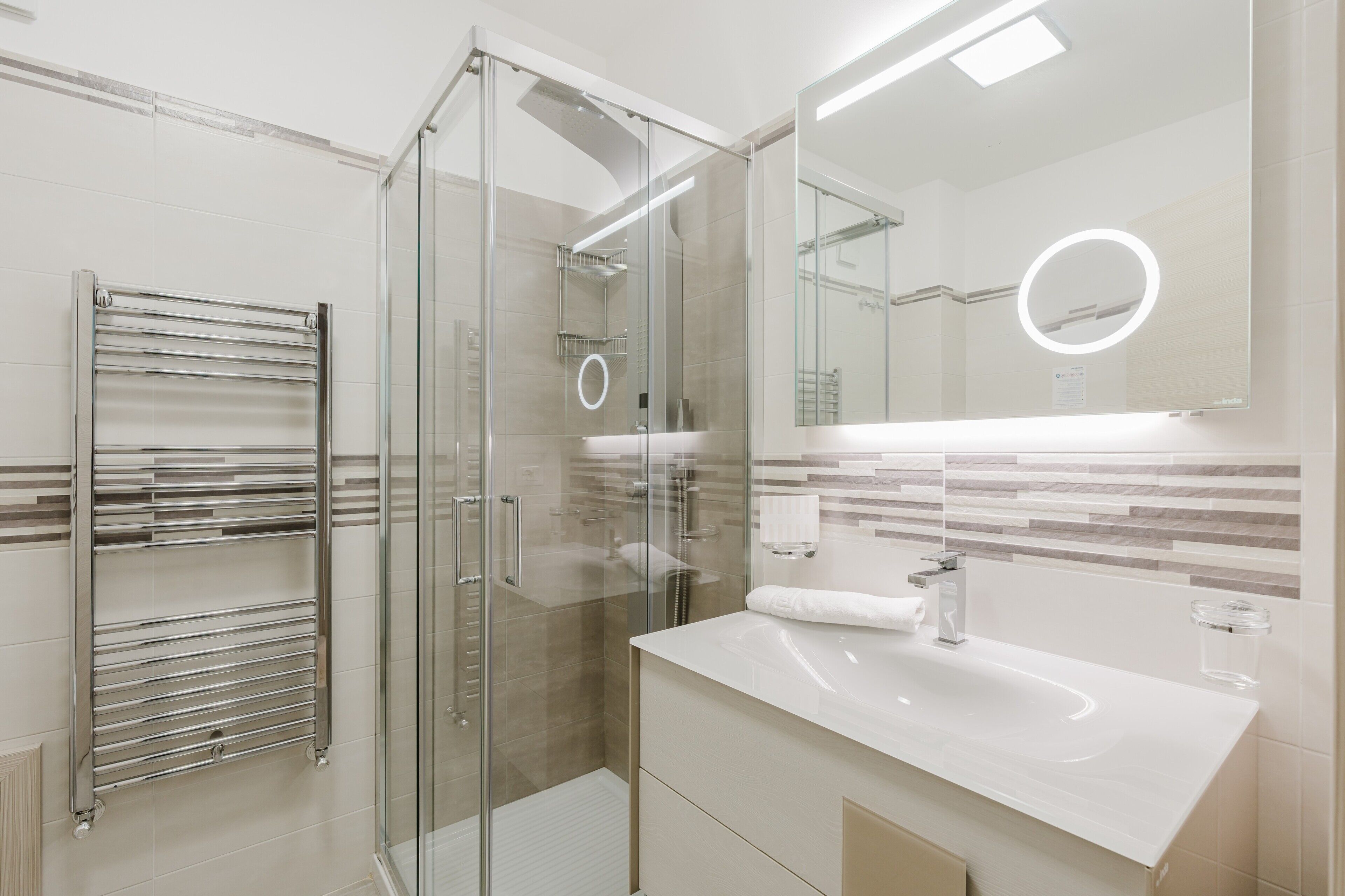 Shower, free toiletries, hair dryer, towels