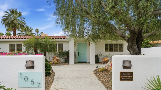 A building with a numbered address sign, a door, and a plaque indicating it was built in 1951. - "La Veranda" a Movie Colony Palm Springs Resort Pool and View Home, #069334 (Palm Springs)