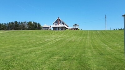 Oceanfront PEI Home with Ocean Views, Wraparound Deck & Private Beach