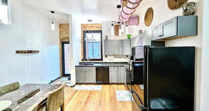 Unique upstairs Escape in Lawrence with space, comfort, wine, golf, and dining.