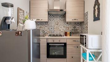 Signature-Apartment, Balkon, Stadtblick | Eigene Küche | Espressomaschine, Wasserkocher