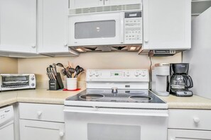 House, Multiple Beds, Balcony, Ocean View (Daytona Surfside Club 109- Blue) | Private kitchen - Daytona Surfside Club 109- Blue Umbrella (Daytona Beach Shores)