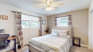 Condo, Multiple Beds, Patio, Garden View (Seaside Escape) | 2 bedrooms, individually decorated, individually furnished, bed sheets