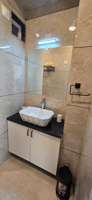 Shower, towels, soap, toilet paper