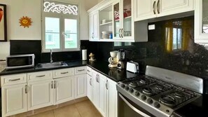 Fridge, microwave, coffee/tea maker, toaster