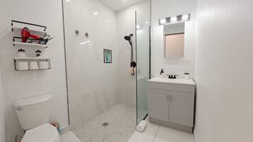 Comfort Apartment, Patio, Garden View | Bathroom | Shower, hair dryer, towels, soap