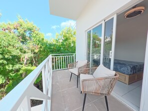 Apartamento Confort, patio, vistas al jardín | Jardines del alojamiento