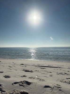 A beach with footprints and a clear sky. - Salty Joe's-WindMark Beach-Pools-Golf Cart-Sleeps 10-InLaw Suite (Port St. Joe)